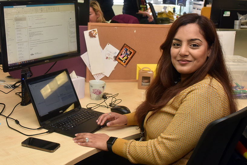 A Red Kite member of staff at her desk