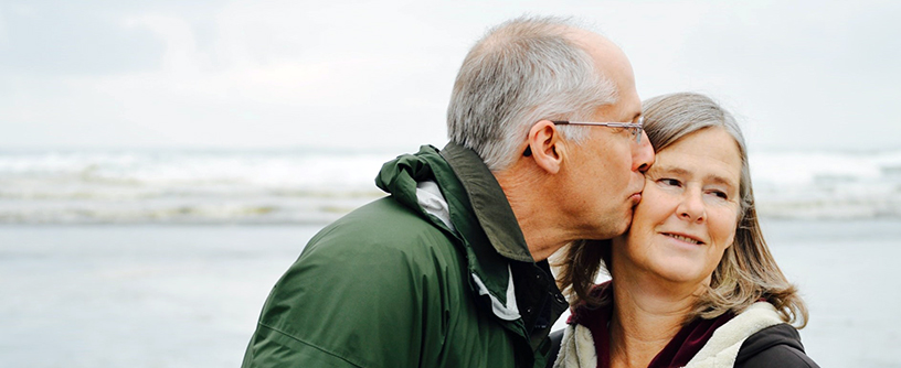 Older couple by the sea