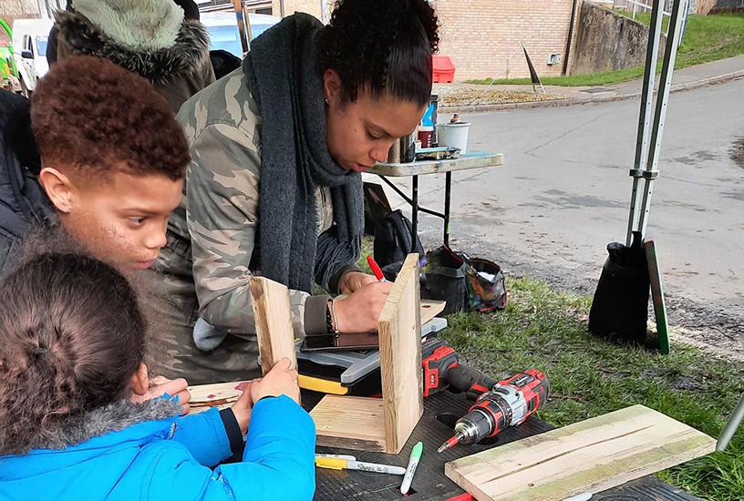 People making a bird box