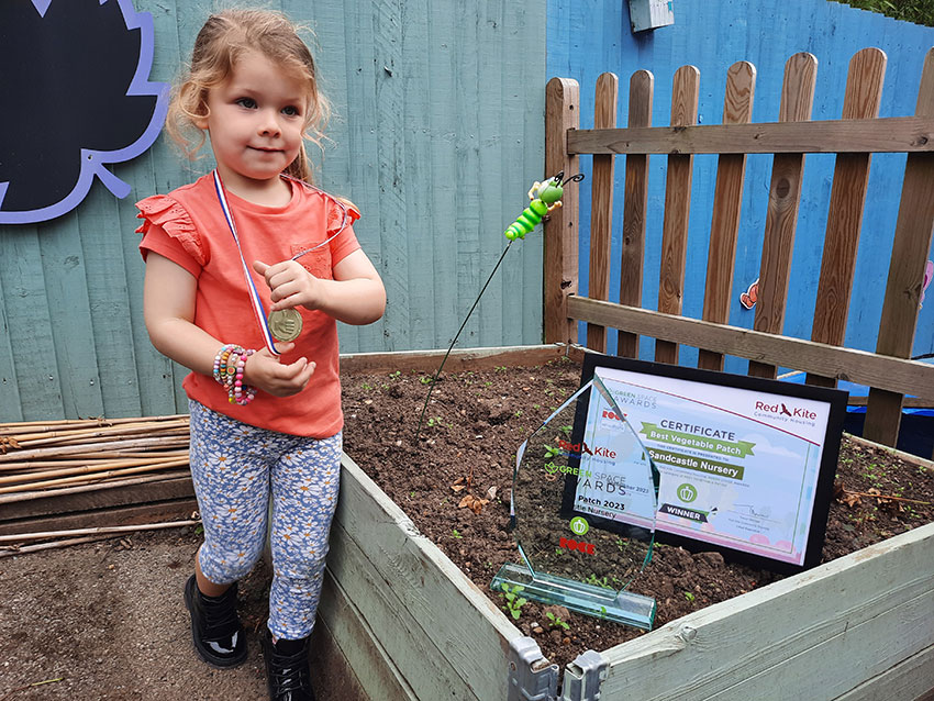 Red Kite Green Space Awards 2023 - A child from Sandcastle nursery
