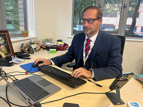 Alan at his desk
