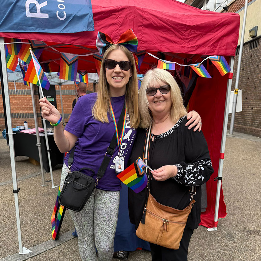 A Red Kite staff member and a tenant volunteer on the stall at Wycombe Pride