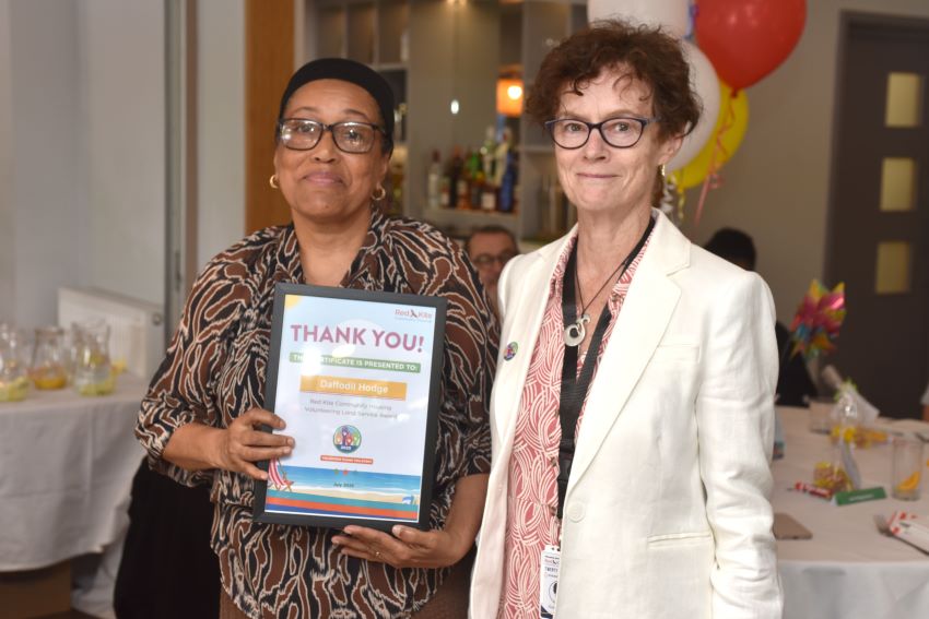 Tenant Being Presented With Her Award