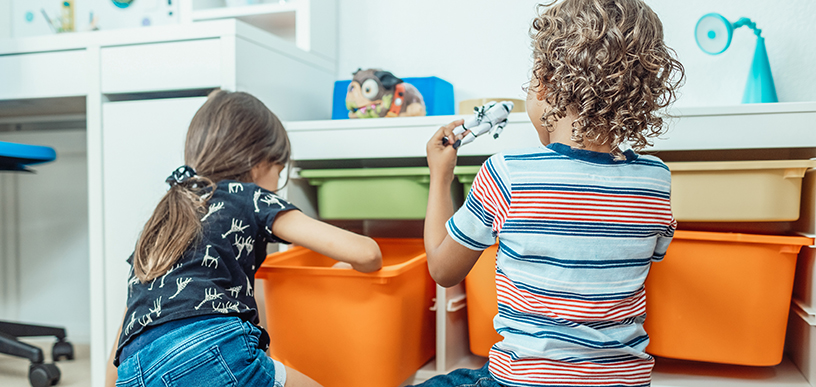 Two children playing with toys