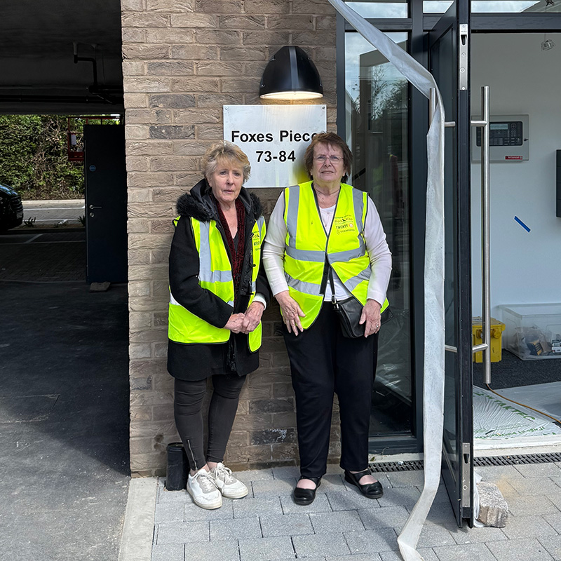 Tenant volunteers outside Foxes Piece