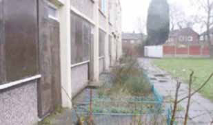 Standard D: Grass has clearly not been attended to for some time e.g. growth of grass onto footpaths, evidence of bonfire and length of grass.