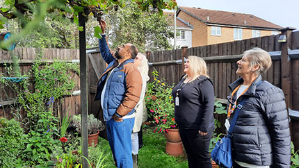 Tenants looking at a winning Green Space Awards garden