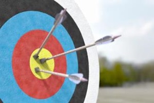 Target with three arrows in bullseye