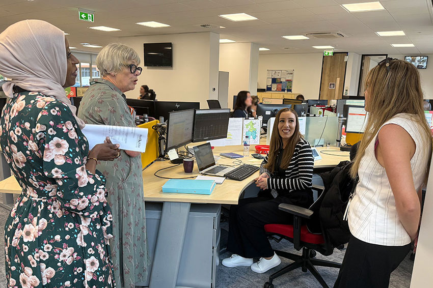 Maggie Galliers CBE, Chair of the National Housing Federation, talking to staff in Red Kite's Contact Centre