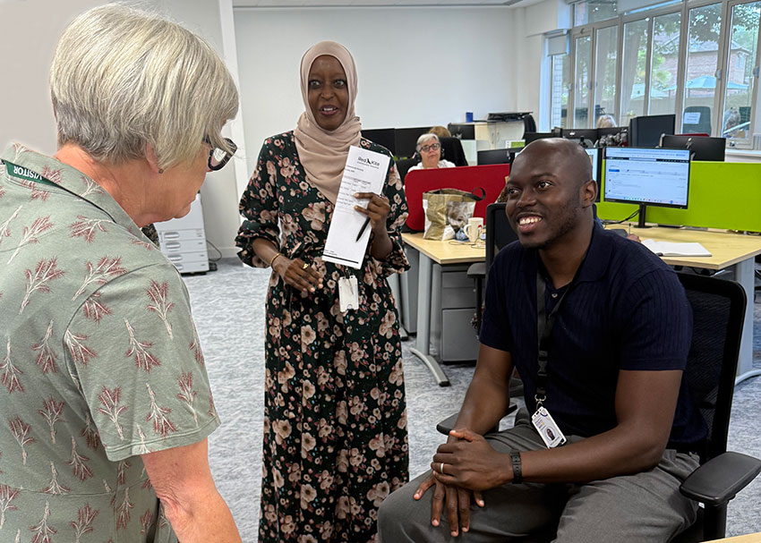 Maggie Galliers CBE, Chair of the National Housing Federation, talking to Malcolm Ankumah, Red Kite's Head of Feedback
