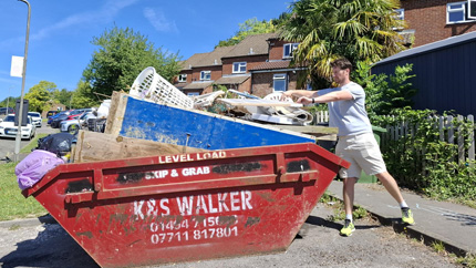 Josh Putting Rubbish In A Skip