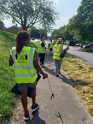 Estate Blitz - A team of litter pickers wearing high vis vests