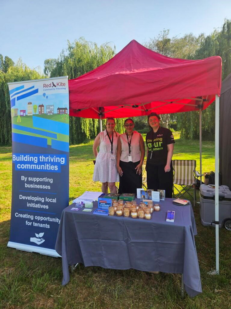 Red Kite colleagues nn Red Kite's stall at Eid in the Park