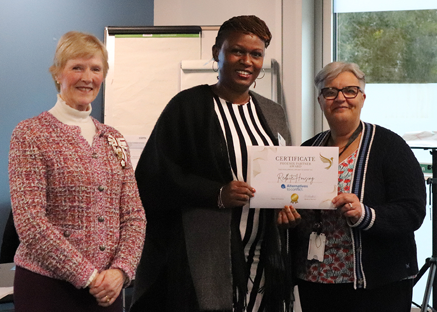 Mary and Lou receiving the Phoenix Award from Countess Howe