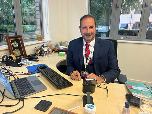 Alan at his desk