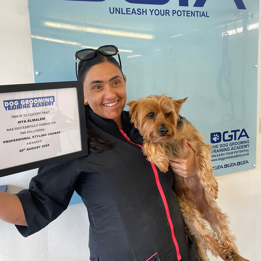 Mya Elmalem with her Dog Grooming Training Academy certificate