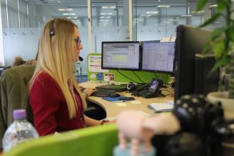 Lyndsey at her desk