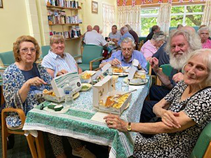 Red Kite tenants enjoying a fish and chips lunch