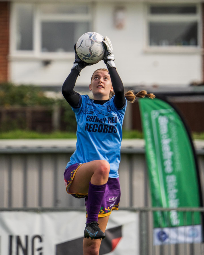 Goalkeeper catching a ball