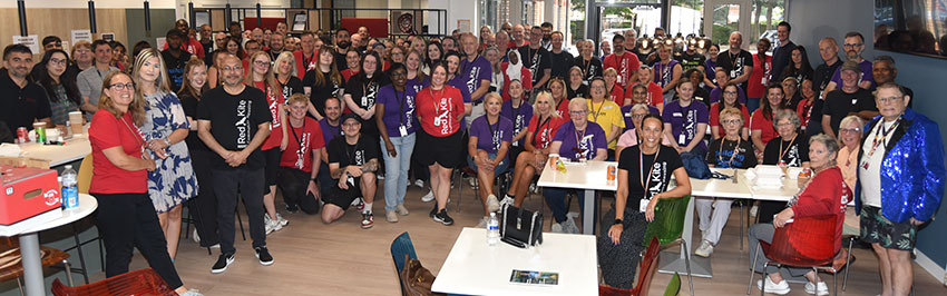 A group photo of the entire Red Kite staff, taken at the 2026 Community Morning
