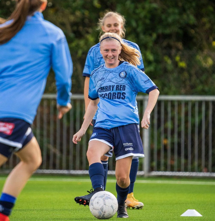 Katie Riddington playing football