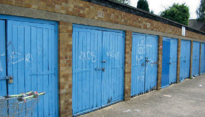 Garages contain small amounts of debris and refuse. There may be small amounts of fly tipping and weed and moss growth. There may be some evidence of disrepair and minor vandalism.