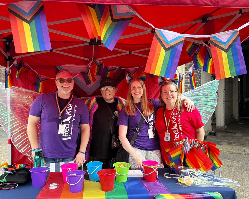 Red Kite staff members and a tenant volunteer on the stall at Wycombe Pride