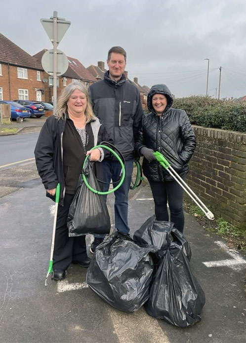 Staff litter picking.