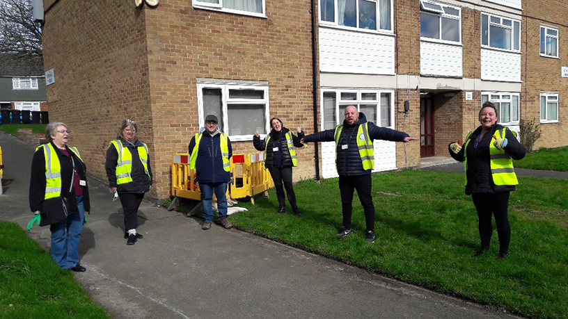 A group shot of colleagues in high vis jackets