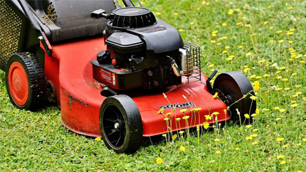 An Image Of A Lawn Mower Cutting Grass