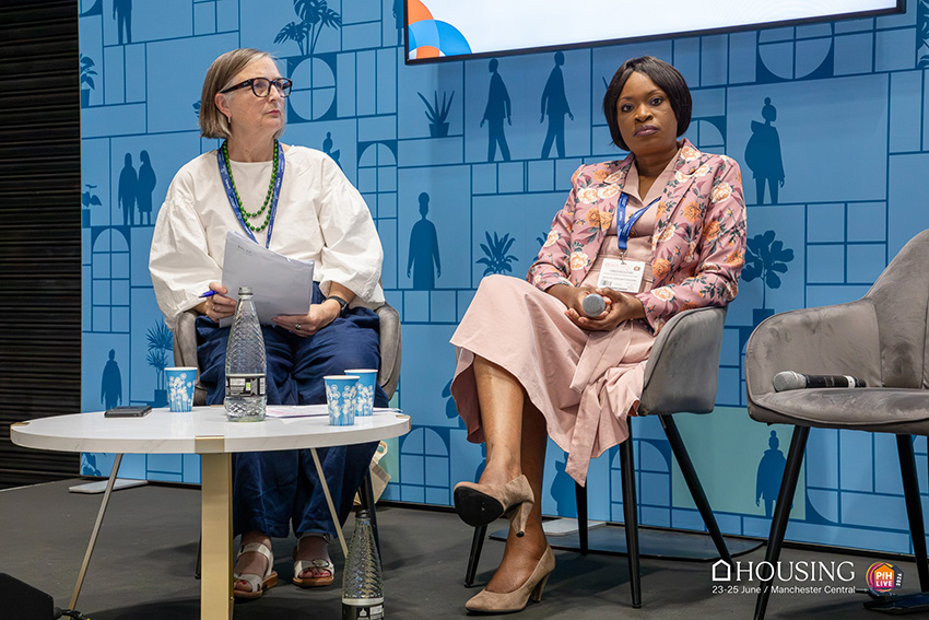 Tenant Board Member Candida on stage at Housing 26