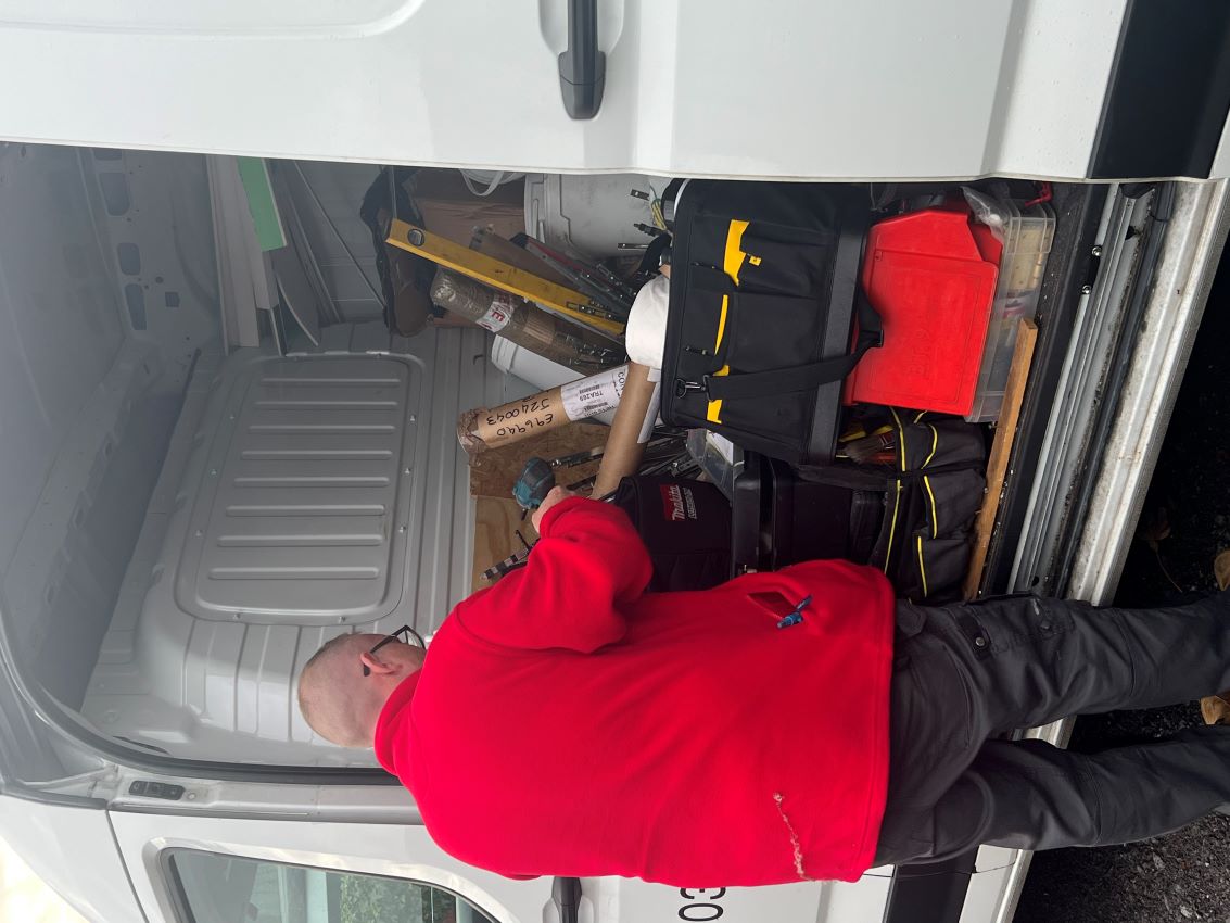 James, a Gilmartins operative, packing up his van at the end of the day