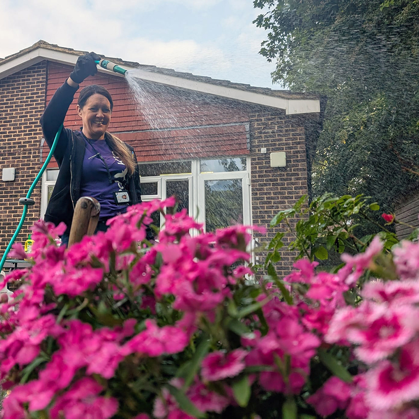 Watering the flowerbeds at Park Street